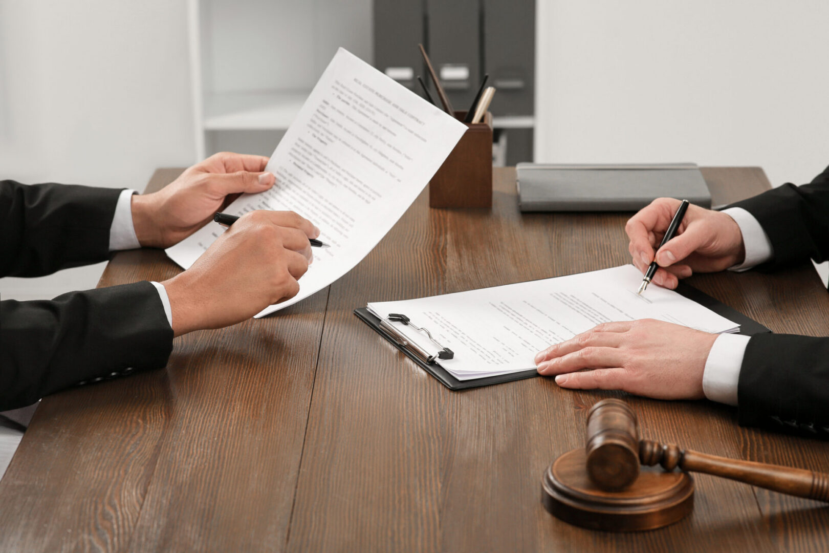 Business meeting with contract and gavel